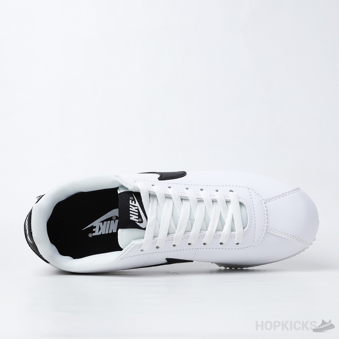 nike cortez white black swoosh